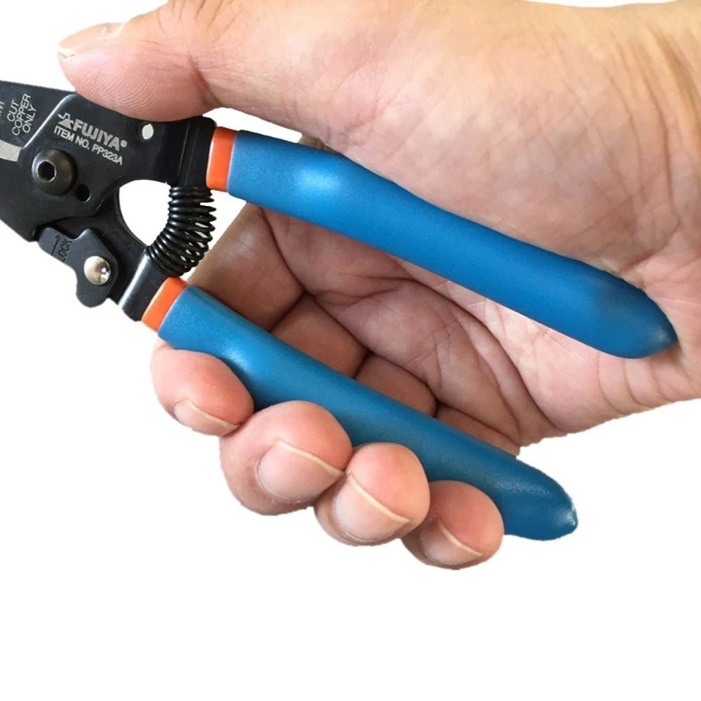 Holding Fujiya PP323A-165 wire stripper in hand – compact fit and control